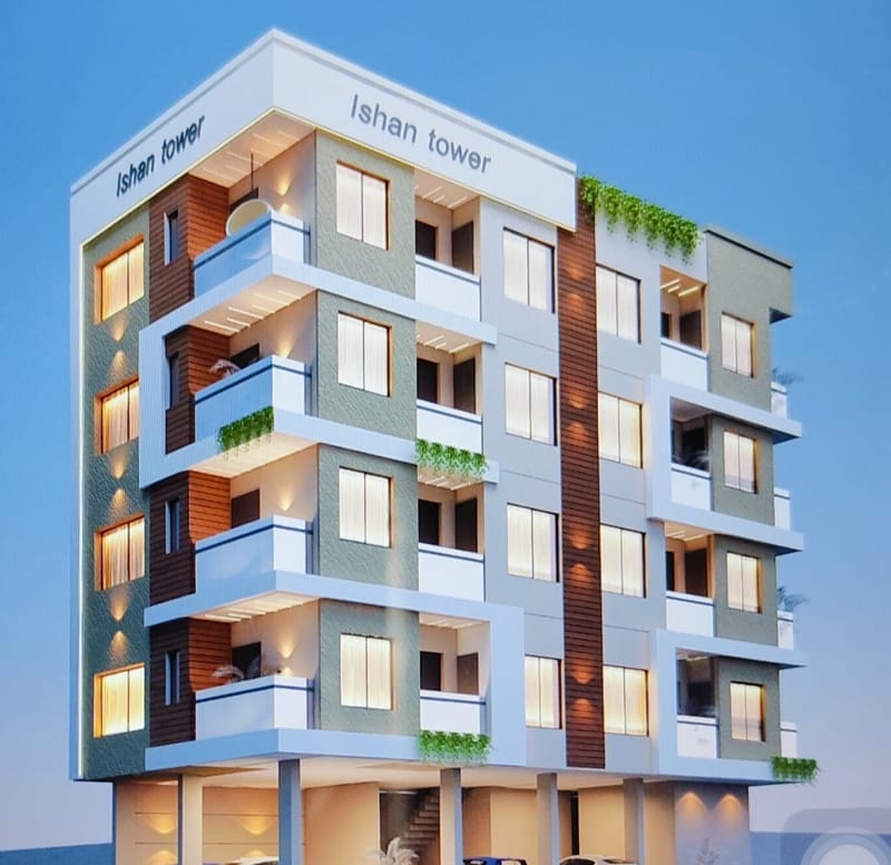 Ishan Tower elevation with the building name on the white parapet band, shown against a clear blue sky.